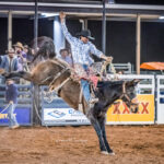 MI227203-Gracemere cowboy Tyler Chong on board 'Wingad' for 70pts in the rd section of the Open Saddle Bronc contest